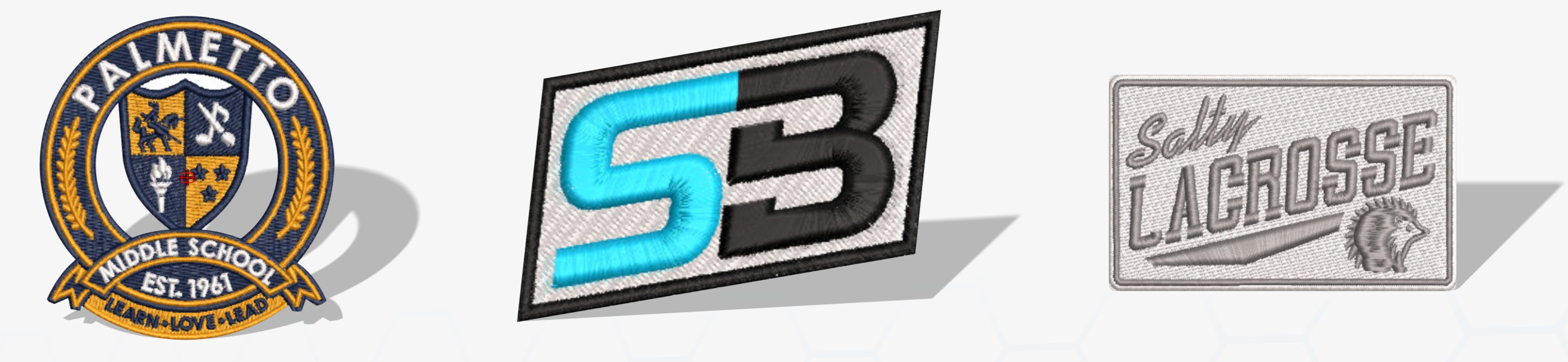 Custom embroidery examples — school crest, Stewart Branding patch, Salty Lacrosse patch