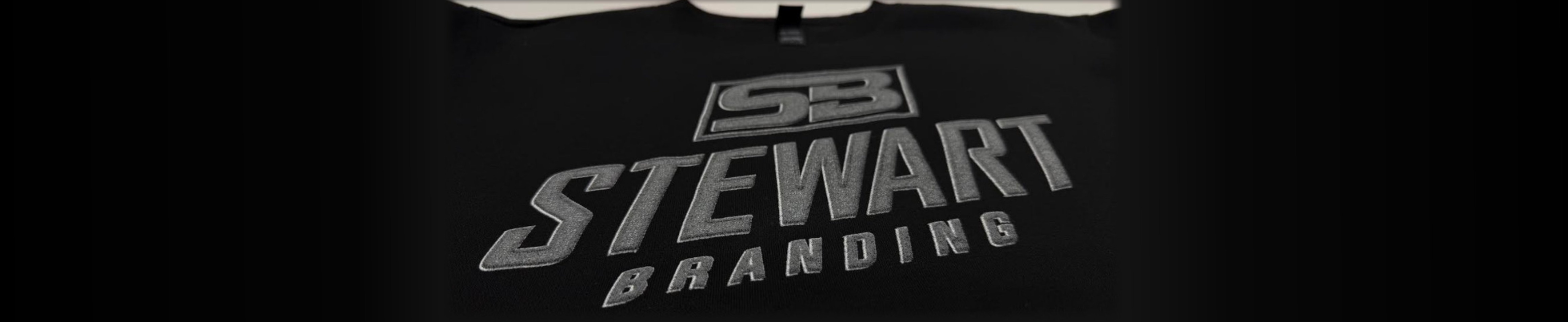 Stewart Branding screen printed apparel on press